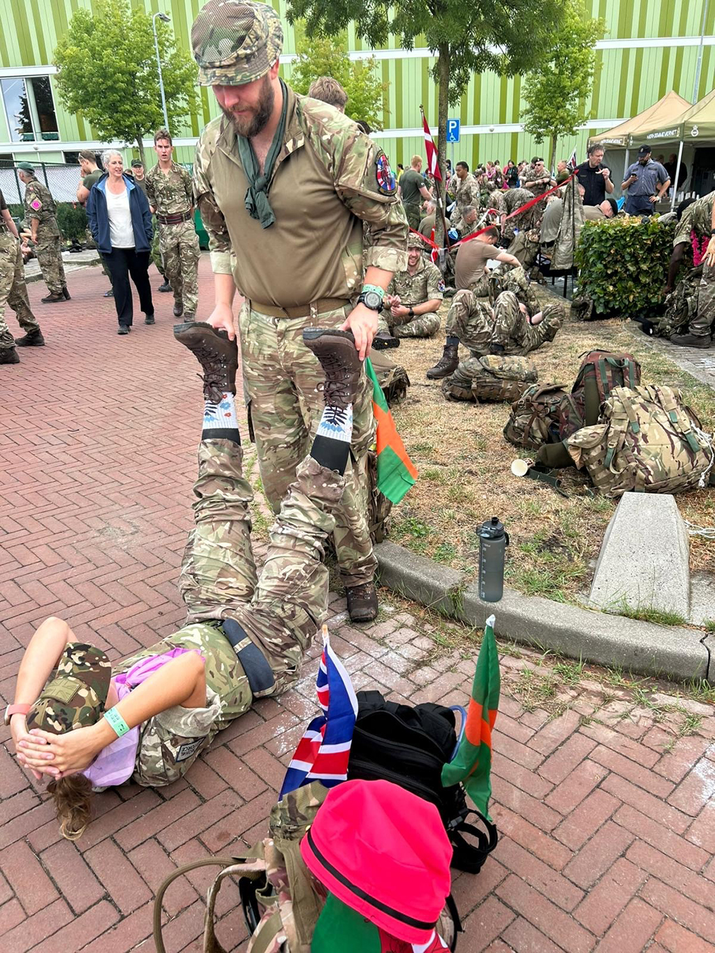 A team member receives rejuvinating leg therapy at a rest station.